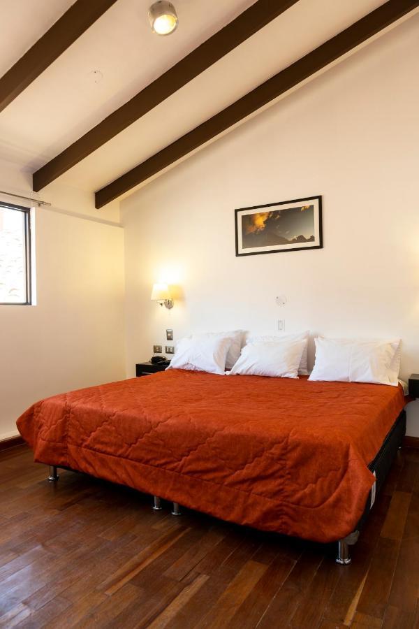 קוסקו Hostal & Apartments El Triunfo מראה חיצוני תמונה