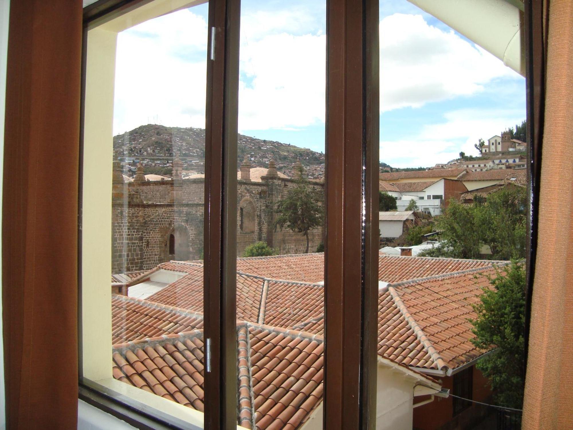 קוסקו Hostal & Apartments El Triunfo מראה חיצוני תמונה