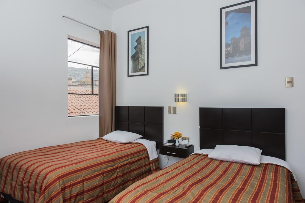 קוסקו Hostal & Apartments El Triunfo מראה חיצוני תמונה