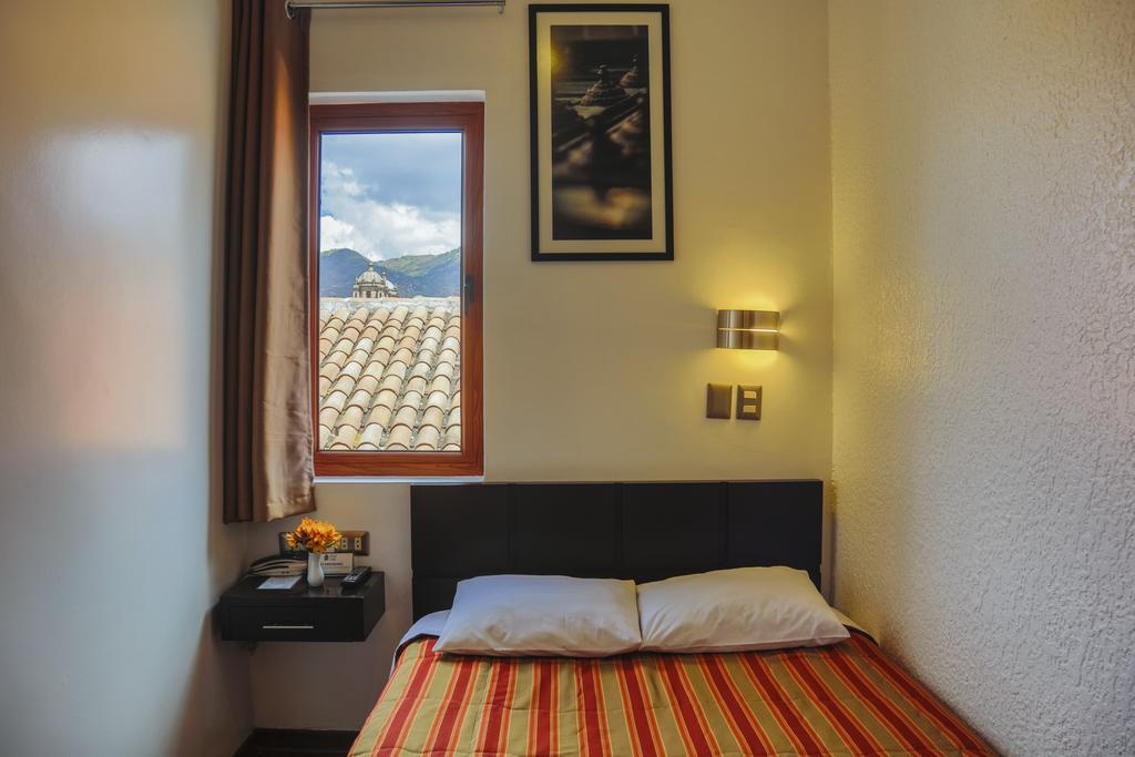 קוסקו Hostal & Apartments El Triunfo מראה חיצוני תמונה