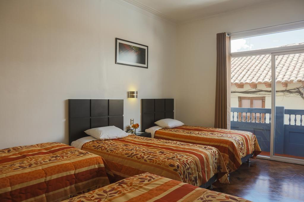 קוסקו Hostal & Apartments El Triunfo מראה חיצוני תמונה