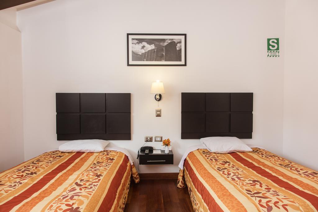 קוסקו Hostal & Apartments El Triunfo מראה חיצוני תמונה
