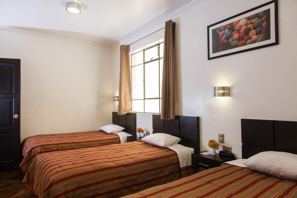 קוסקו Hostal & Apartments El Triunfo מראה חיצוני תמונה